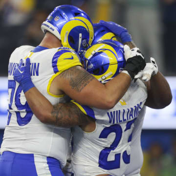 Dec 3, 2023; Inglewood, California, USA; Los Angeles Rams offensive linesmen Rob Havenstein (79) Los Angeles Rams running back Kyren Williams (23) and Los Angeles Rams offensive linesmen Steve Avila (73) celebrate during the second half in a game against the Cleveland Browns at SoFi Stadium. Mandatory Credit: Yannick Peterhans-USA TODAY Sports
