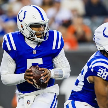 Aug 22, 2024; Cincinnati, Ohio, USA; Indianapolis Colts quarterback Anthony Richardson (5) runs with the ball against the Cincinnati Bengals in the first half at Paycor Stadium. Mandatory Credit: Katie Stratman-Imagn Images