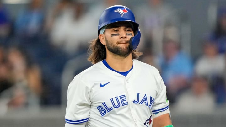 Jun 29, 2024; Toronto, Ontario, CAN; Toronto Blue Jays shortstop Bo Bichette (11) reacts to striking out against the New York Yankees at Rogers Centre