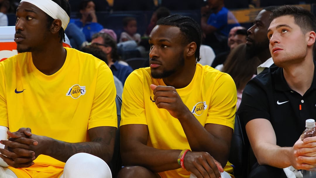 Jul 7, 2024; San Francisco, CA, USA; Los Angeles Lakers guard Bronny James Jr. (9) on the bench with his hand on his knee during the fourth quarter against the Golden State Warriors at Chase Center. Mandatory Credit: Kelley L Cox-USA TODAY Sports