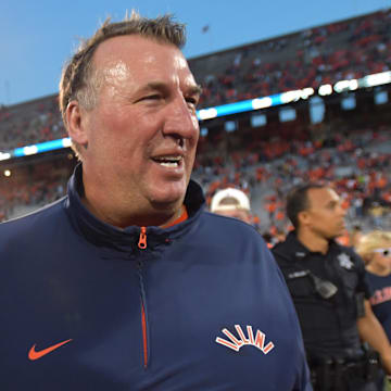 Oct 12, 2024; Champaign, Illinois, USA; Illinois Fighting Illini head coach Bret Bielema celebrates a 50-49 win over the Purdue Boilermakers at Memorial Stadium. Mandatory Credit: Ron Johnson-Imagn Images