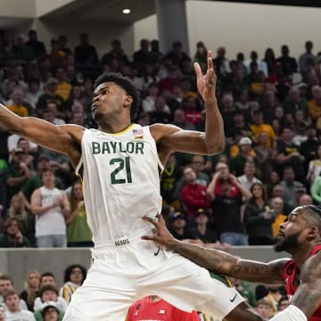 Feb 24, 2024; Waco, Texas, USA; Baylor Bears center Yves Missi (21) attempts to catch the ball during the second half against the Houston Cougars at Paul and Alejandra Foster Pavilion. Mandatory Credit: Raymond Carlin III-USA TODAY Sports