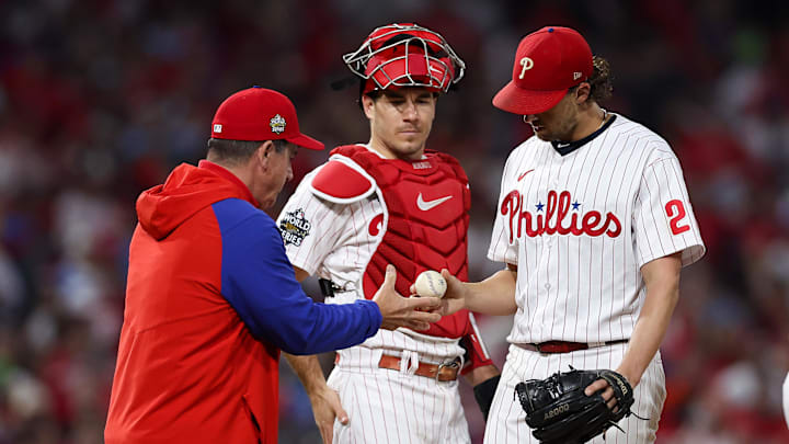 Nov 2, 2022; Philadelphia, Pennsylvania, USA; Philadelphia Phillies starting pitcher Aaron Nola (27) is removed from the game by manager Rob Thomson (59) during the fifth inning against the Houston Astros in game four of the 2022 World Series at Citizens Bank Park. Mandatory Credit: Bill Streicher-Imagn Images