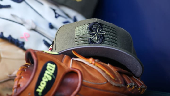 May 20, 2023; Atlanta, Georgia, USA; A detailed view of the Seattle Mariners armed forces day hat in the dugout against the Atlanta Braves in the first inning at Truist Park. Mandatory Credit: Brett Davis-USA TODAY Sports