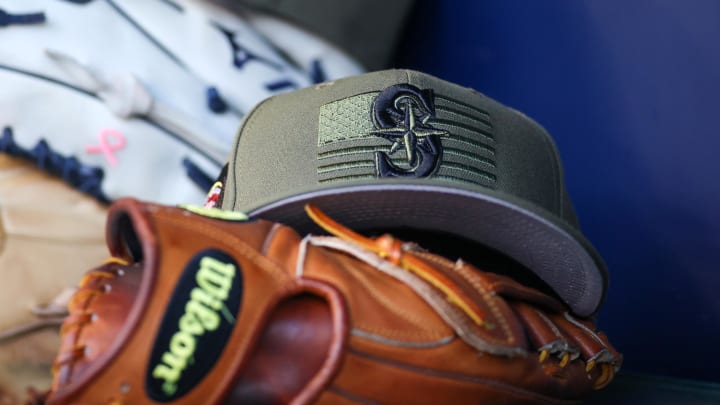 A detailed view of the Seattle Mariners armed forces day hat in the dugout against the Atlanta Braves in the first inning at Truist Park in 2023.