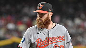 Apr 9, 2025; Phoenix, Arizona, USA;  Baltimore Orioles pitcher Colin Selby (60) looks on in the eighth inning against the Arizona Diamondbacks at Chase Field. 