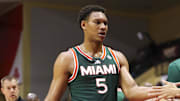Nov 28, 2025; Kissimmee, FL, USA; Miami (FL) Hurricanes forward Malik Reneau (5) reacts to the beach after being subbed out against the Georgetown Hoyas in the second half during the ESPN Events Invitational at State Farm Field House. Mandatory Credit: Nathan Ray Seebeck-Imagn Images