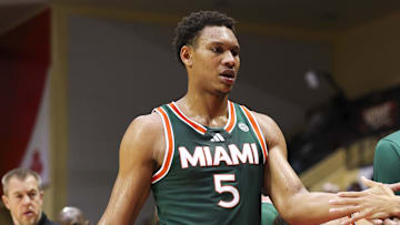 Nov 28, 2025; Kissimmee, FL, USA; Miami (FL) Hurricanes forward Malik Reneau (5) reacts to the beach after being subbed out against the Georgetown Hoyas in the second half during the ESPN Events Invitational at State Farm Field House. Mandatory Credit: Nathan Ray Seebeck-Imagn Images