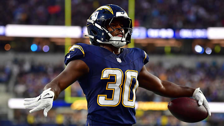 Oct 23, 2025; Inglewood, California, USA; Los Angeles Chargers running back Kimani Vidal (30) reacts after scoring a touchdown against the Minnesota Vikings during the first half at SoFi Stadium. Mandatory Credit: Gary A. Vasquez-Imagn Images