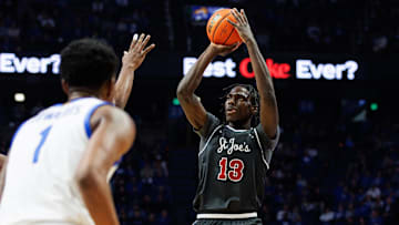 Nov 20, 2023; Lexington, Kentucky, USA; Saint Joseph's Hawks forward Rasheer Fleming (13) shoots the ball during the first half against the Kentucky Wildcats at Rupp Arena at Central Bank Center. Mandatory Credit: Jordan Prather-Imagn Images