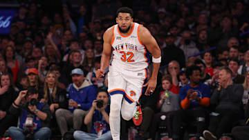 Mar 30, 2025; New York, New York, USA; New York Knicks center Karl-Anthony Towns (32) runs up court during the first half against the Portland Trail Blazers at Madison Square Garden. Mandatory Credit: Vincent Carchietta-Imagn Images