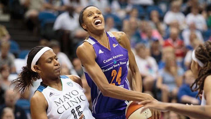 Jun 27, 2015; Minneapolis, MN, USA; Phoenix Mercury guard DeWanna Bonner (24) shoots in the first quarter against the Minnesota Lynx forward Asjha Jones (15) at Target Center. Mandatory Credit: Brad Rempel-Imagn Images