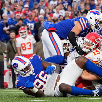 Nov 2, 2025; Orchard Park, New York, USA; Kansas City Chiefs quarterback Patrick Mahomes (15) is sacked by Buffalo Bills linebacker Terrel Bernard (8) and defensive end Joey Bosa (97) at Highmark Stadium.