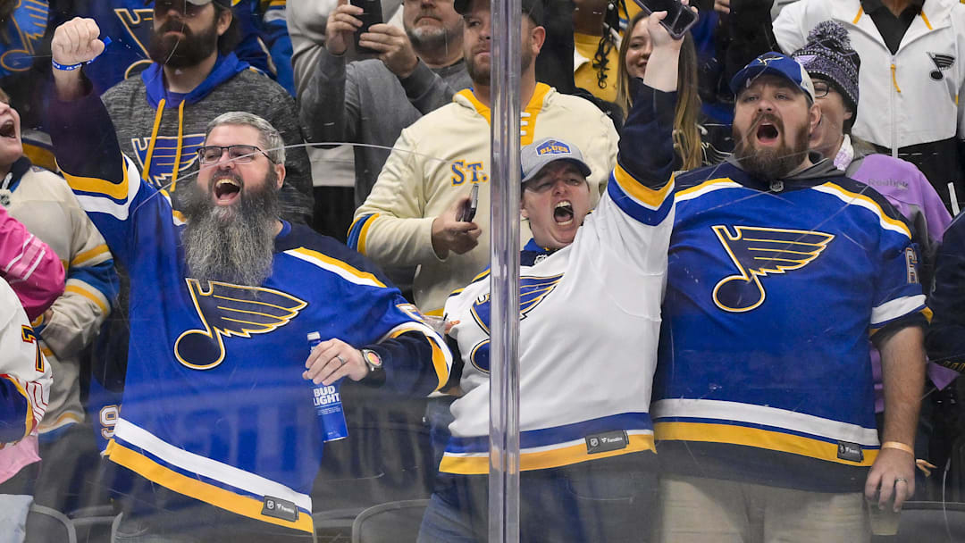 Oct 23, 2025; St. Louis, Missouri, USA; St. Louis Blues fans react after St. Louis Blues center Pius Suter (not pictured) scored against the Utah Mammoth during the second period at Enterprise Center. Mandatory Credit: Jeff Curry-Imagn Images