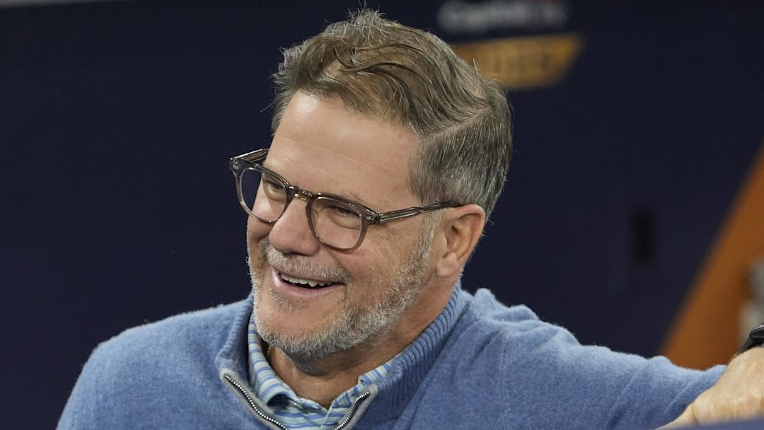 Oct 23, 2025; Toronto, ON, Canada; Toronto Blue Jays Executive Vice President, Baseball Operations and General Manager Ross Atkins talk during batting pratice on media day before game one of the World Series at Rogers Centre. 