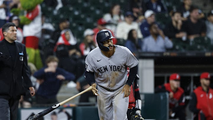 Aug 29, 2025; Chicago, Illinois, USA; New York Yankees center fielder Trent Grisham (12) watches his grand slam against the Chicago White Sox during the fourth inning at Rate Field. Mandatory Credit: Kamil Krzaczynski-Imagn Images