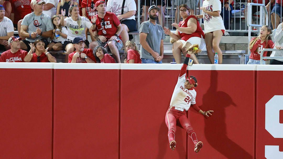 Oklahoma outfielder Jayda Coleman (24) catches the ball for an out in the fifth inning of a softball game between the Oklahoma Sooners (OU) and the Florida State Seminoles in Game 2 of the Norman Super Regional in the NCAA Tournament at Love's Field, Friday, May 24, 2024. Oklahoma won 4-2 to advance to the Women's College World Series. Oklahoma outfielder Jayda Coleman (24) catches the ball for an out in the fifth inning of a softball game between the Oklahoma Sooners (OU) and the Florida State Seminoles in Game 2 of the Norman Super Regional in the NCAA Tournament at Love's Field, Friday, May 24, 2024. Oklahoma won 4-2 to advance to the Women's College World Series.