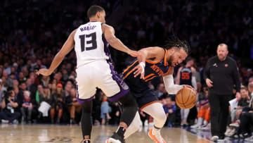 Apr 4, 2024; New York, New York, USA; New York Knicks guard Jalen Brunson (11) is fouled by Sacramento Kings forward Keegan Murray (13) during the second quarter at Madison Square Garden. Mandatory Credit: Brad Penner-USA TODAY Sports