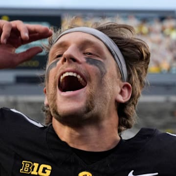 Iowa Hawkeyes quarterback Mark Gronowski (11) celebrates after defeating the Minnesota Golden Gophers Oct. 25, 2025 at Kinnick Stadium in Iowa City, Iowa.