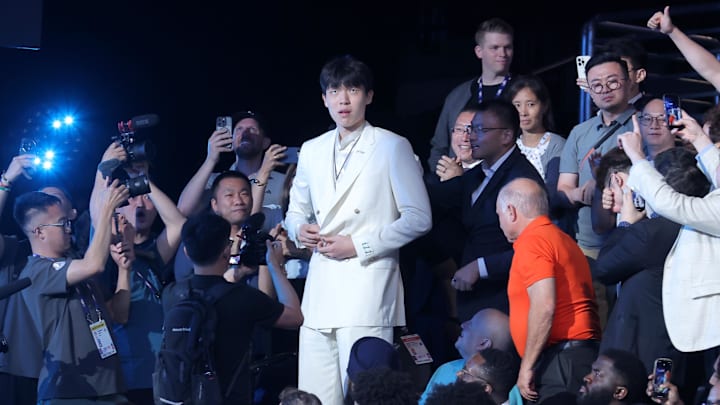 Yang walks to the stage after being selected as the 16th pick by the Memphis Grizzlies in the first round of the 2025 NBA Draft at Barclays Center. Yang walks to the stage after being selected as the 16th pick by the Memphis Grizzlies in the first round of the 2025 NBA Draft at Barclays Center.