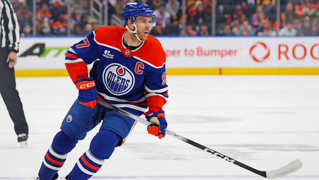 Sep 28, 2025; Edmonton, Alberta, CAN; Edmonton Oilers forward Connor McDavid (97) follows the play against the Vancouver Canucks at Rogers Place. Mandatory Credit: Perry Nelson-Imagn Images