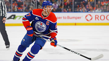 Sep 28, 2025; Edmonton, Alberta, CAN; Edmonton Oilers forward Connor McDavid (97) follows the play against the Vancouver Canucks at Rogers Place. Mandatory Credit: Perry Nelson-Imagn Images