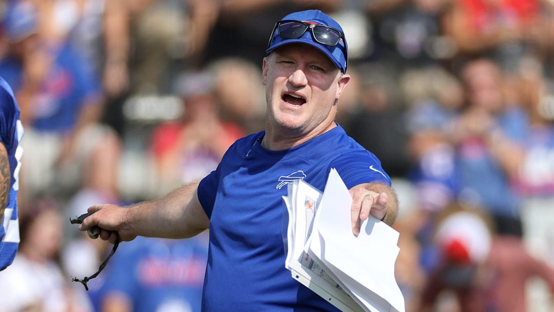 Bills special teams coach Matthew Smiley gets his players organized to run a play during practice.