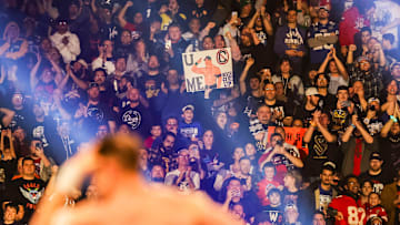 Fans celebrate John Cena on Saturday, Feb. 1, 2025, during the WWE Royal Rumble at Lucas Oil Stadium in Indianapolis.