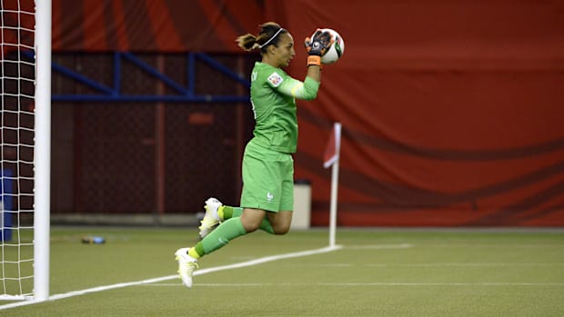 France goalkeeper Sarah Bouhaddi makes a save vs. Germany during the first half in the quarterfinals of the 2015 World Cup.