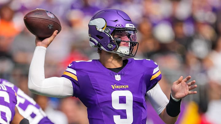 Minnesota Vikings quarterback J.J. McCarthy passes a ball during a preseason game.