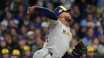 Oct 9, 2025; Chicago, Illinois, USA; Milwaukee Brewers pitcher Freddy Peralta (51) throws pitch against the Chicago Cubs during the first inning for game four of the NLDS round for the 2025 MLB playoffs at Wrigley Field. Mandatory Credit: David Banks-Imagn Images