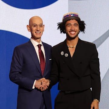 Jun 26, 2024; Brooklyn, NY, USA; Jared McCain poses for photos with NBA commissioner Adam Silver after being selected in the first round by the Philadelphia 76ers in the 2024 NBA Draft at Barclays Center. Mandatory Credit: Brad Penner-Imagn Images