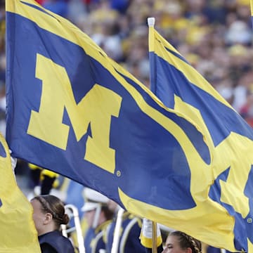 Aug 31, 2024; Ann Arbor, Michigan, USA;  Michigan Wolverines marching band take the field before a game against the Fresno State Bulldogs at Michigan Stadium.