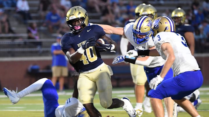 Spartanburg Vikings Trenton Lynch (40) rushes the ball Friday, Sept. 5, 2025 during the SCHSL football game against the Broome Centurions at Spartanburg High School in Spartanburg, South Carolina. Spartanburg Vikings Trenton Lynch (40) rushes the ball Friday, Sept. 5, 2025 during the SCHSL football game against the Broome Centurions at Spartanburg High School in Spartanburg, South Carolina.