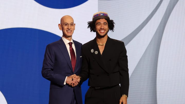 Jun 26, 2024; Brooklyn, NY, USA; Jared McCain poses for photos with NBA commissioner Adam Silver after being selected in the first round by the Philadelphia 76ers in the 2024 NBA Draft at Barclays Center. Mandatory Credit: Brad Penner-USA TODAY Sports