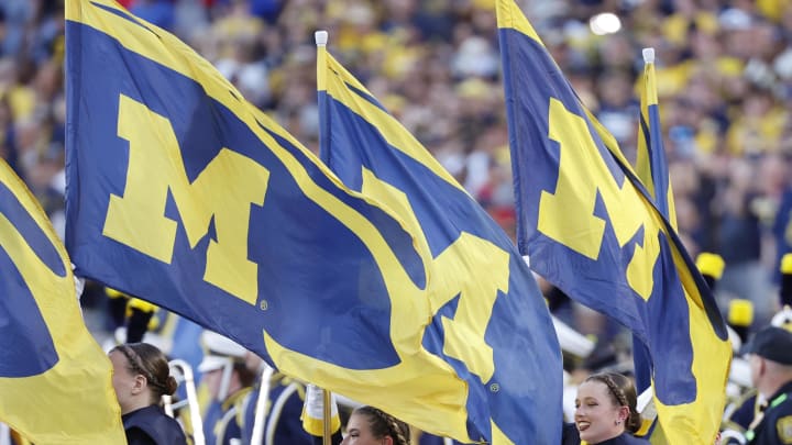 Aug 31, 2024; Ann Arbor, Michigan, USA;  Michigan Wolverines marching band take the field before a game against the Fresno State Bulldogs at Michigan Stadium.