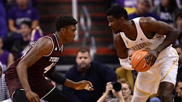 Dec 5, 2017; Phoenix, AZ, USA; Texas A&M Aggies forward Robert Williams (44) guards Arizona Wildcats forward Deandre Ayton (13) during the first half at Talking Stick Resort Arena. Mandatory Credit: Joe Camporeale-Imagn Images