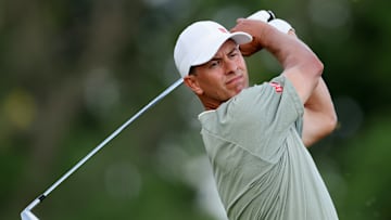 Adam Scott takes a swing during the third round of the 2025 U.S. Open at Oakmont Country Club