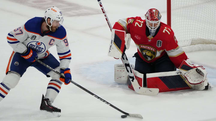 Jun 24, 2024; Sunrise, Florida, USA; Florida Panthers goaltender Sergei Bobrovsky (72) defends against Edmonton Oilers forward Connor McDavid (97) during the third period in game seven of the 2024 Stanley Cup Final at Amerant Bank Arena. Mandatory Credit: Jim Rassol-USA TODAY Sports