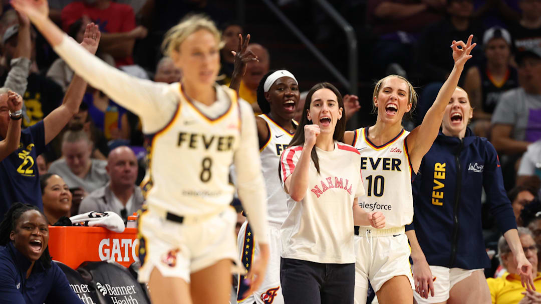 Indiana Fever guard Caitlin Clark celebrated a three-pointer from Sophie Cunningham against the Phoenix Mercury.