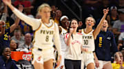 Indiana Fever guard Caitlin Clark celebrated a three-pointer from Sophie Cunningham against the Phoenix Mercury.
