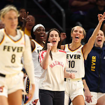 Indiana Fever guard Caitlin Clark celebrated a three-pointer from Sophie Cunningham against the Phoenix Mercury.