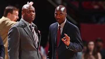 Dec 11, 2016; Tallahassee, FL, USA; Florida State Seminoles head coach Leonard Hamilton listens to assistant coach Charlton Young in the first half against the Florida Gators at the Donald L. Tucker Center. The Florida State Seminoles won 83-78. Mandatory Credit: Phil Sears-Imagn Images