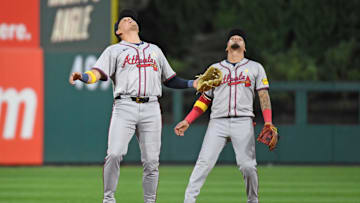 Sep 1, 2024; Philadelphia, Pennsylvania, USA; Atlanta Braves third base Gio Urshela (9) and shortstop Orlando Arcia (11) track a pop up during the third inning against the Philadelphia Phillies at Citizens Bank Park. Mandatory Credit: Eric Hartline-Imagn Images