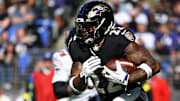 Oct 26, 2025; Baltimore, Maryland, USA; Baltimore Ravens running back Derrick Henry (22) rushes during the second quarter against the Chicago Bears at M&T Bank Stadium. Mandatory Credit: Tommy Gilligan-Imagn Images