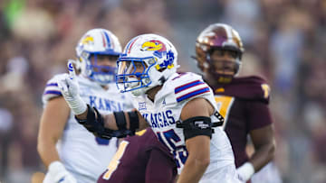 Oct 5, 2024; Tempe, Arizona, USA; Kansas Jayhawks defensive end Dean Miller (45) celebrates a play against the Arizona State Sun Devils in the first half at Mountain America Stadium. Mandatory Credit: Mark J. Rebilas-Imagn Images