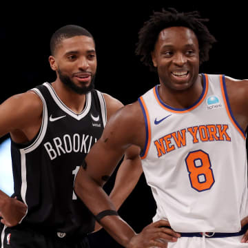 Jan 23, 2024; Brooklyn, New York, USA; Brooklyn Nets forward Mikal Bridges (1) and New York Knicks forward OG Anunoby (8) talk during the first quarter at Barclays Center. Mandatory Credit: Brad Penner-USA TODAY Sports