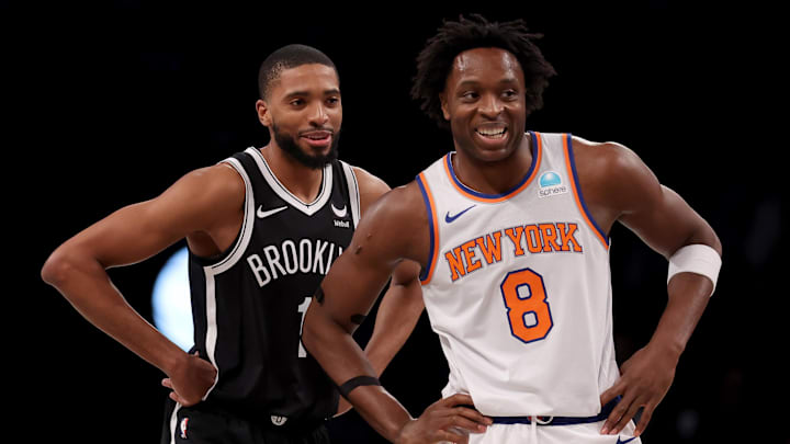 Jan 23, 2024; Brooklyn, New York, USA; Brooklyn Nets forward Mikal Bridges (1) and New York Knicks forward OG Anunoby (8) talk during the first quarter at Barclays Center. Mandatory Credit: Brad Penner-Imagn Images