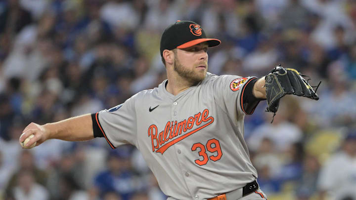 Aug 28, 2024; Los Angeles, California, USA;  Baltimore Orioles starting pitcher Corbin Burnes (39) delivers to the plate in the first inning against the Los Angeles Dodgers at Dodger Stadium.