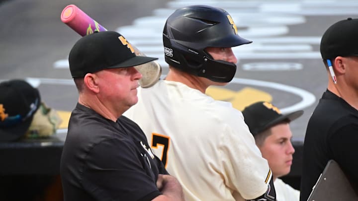 Southern Miss Golden Eagles head coach Christian Ostrander watches the action against the Ole Miss Rebels at Pete Taylor Park in Hattiesburg, Miss., on Mar. 10, 2026. Southern Miss Golden Eagles head coach Christian Ostrander watches the action against the Ole Miss Rebels at Pete Taylor Park in Hattiesburg, Miss., on Mar. 10, 2026.
